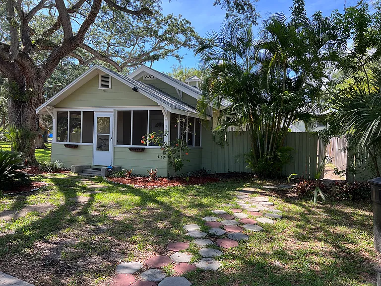 Front yard and with screened porch