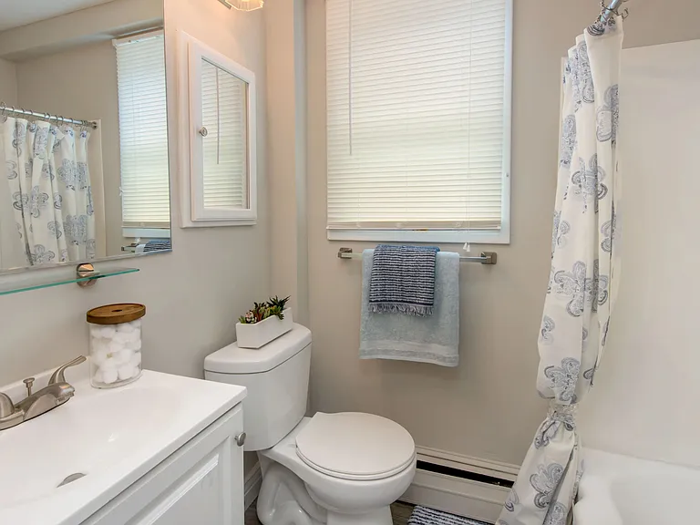 Escape to your personal sanctuary - our bathroom offers style, space, and serenity.