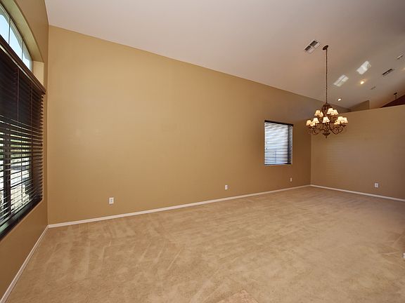 Formal dining area with chandelier