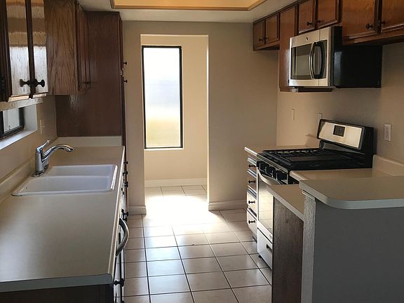 Window over kitchen sink, designer lighting