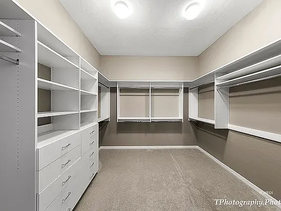 Master Closet w/adjustable shelving, carpet