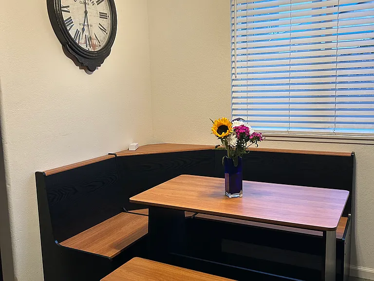 Dining table with bench storage.