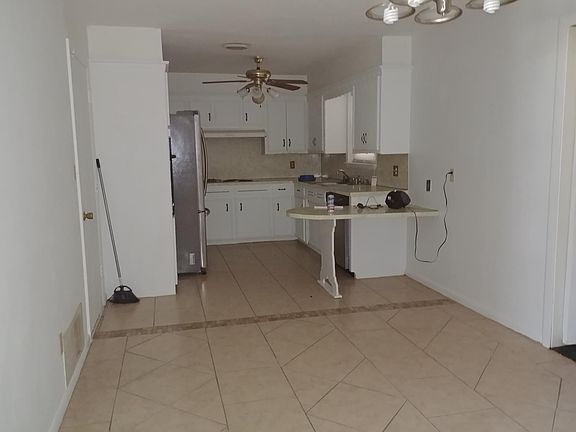 the kitchen and it has a dinning place in there to 