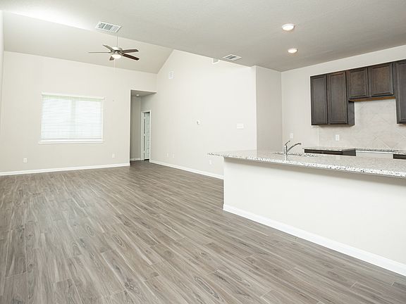 Dining Area to Kitchen and Family Room