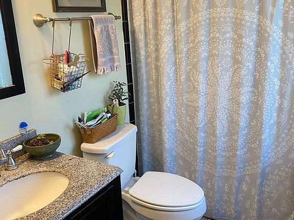 private bath in one bedroom