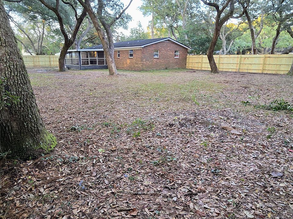Backyard with new privacy fence