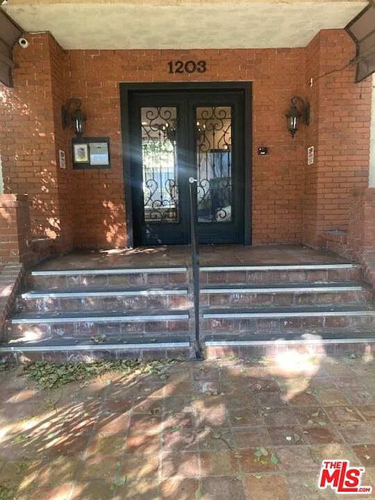 Building Photo - 1203 N Sweetzer Ave #104