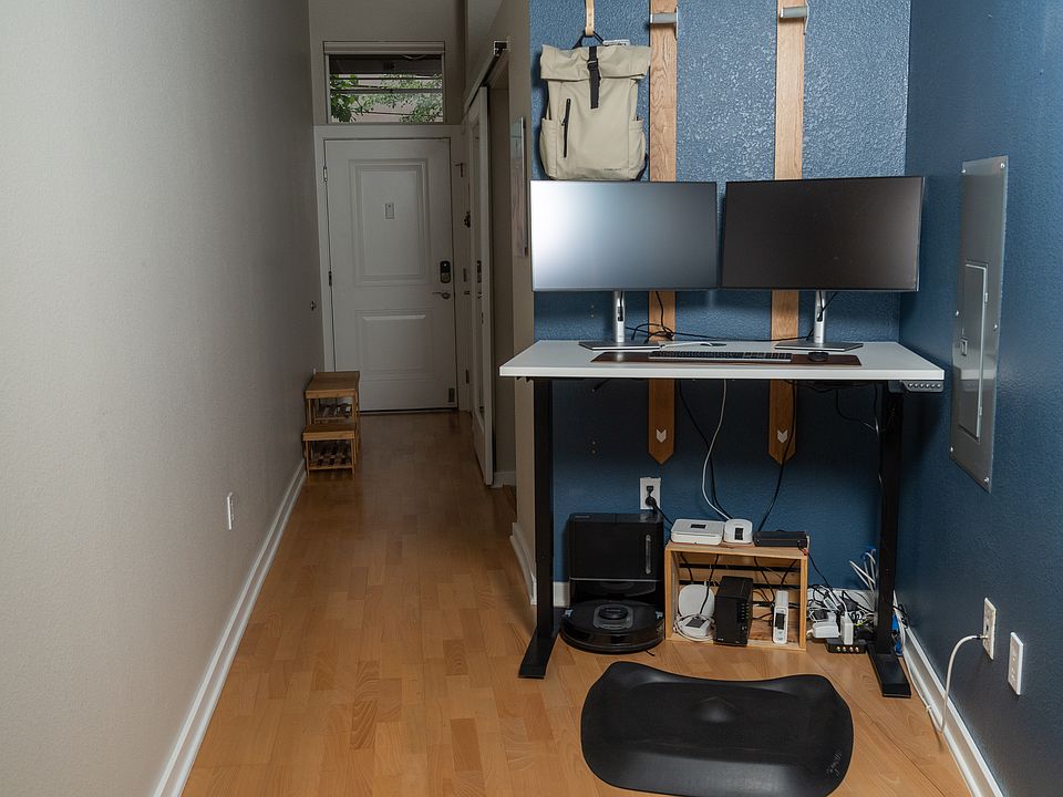 Office with sit / stand desk

Note: Monitors, backpack, keyboard, and mouse are for display only.