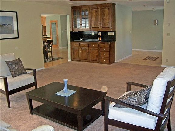living room w/surround sound and wet bar