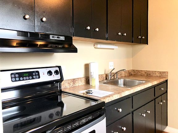 Newly updated kitchen with stainless appliances and granite counters
