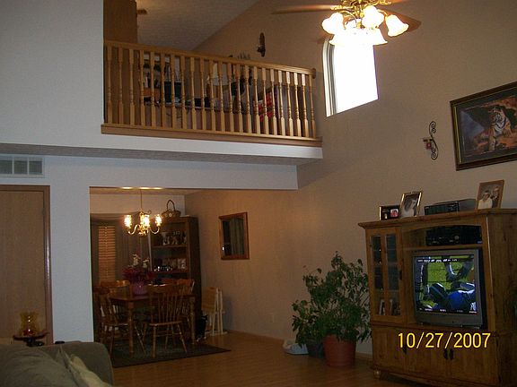 great room with loft above