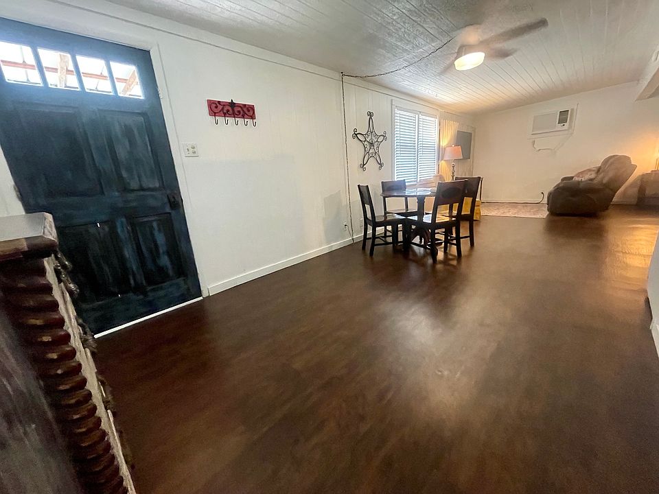 Right inside the entry door.