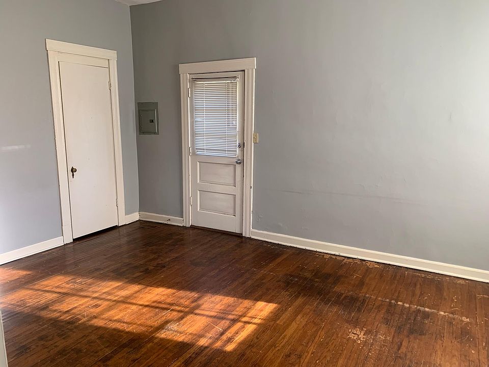 Large Living room, with hardwood floors and natural light.