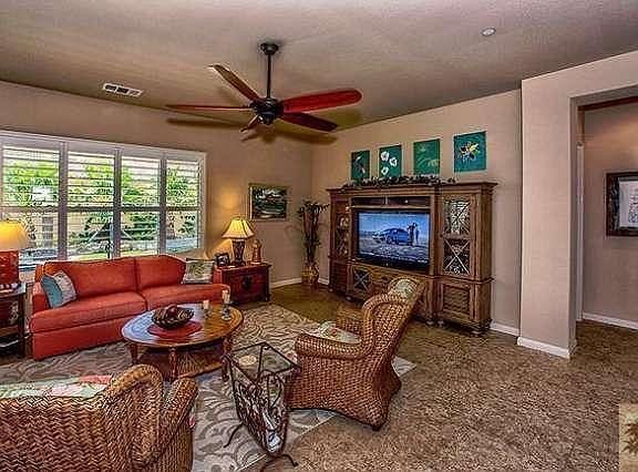 Great Room is spacious, offers great view of private yard. Hunter Douglas Plantation Shutters, Ceili