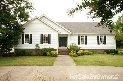 468 Pioneer Lane
						:
						Semi-circle drive on front. Garage opens on south side of house.