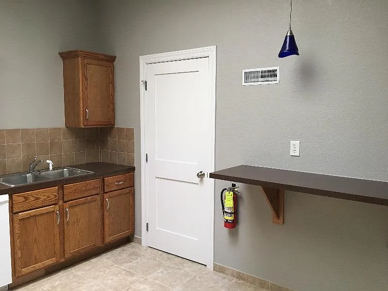 Kitchen area - closed door is full bathroom with laundry