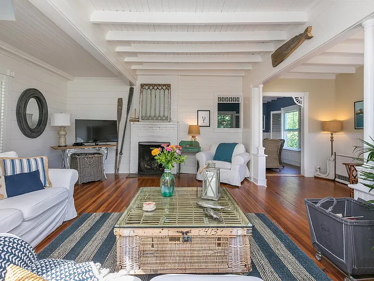Open living room with gas fireplace is super sunny and so incredibly cozy in the winter time.