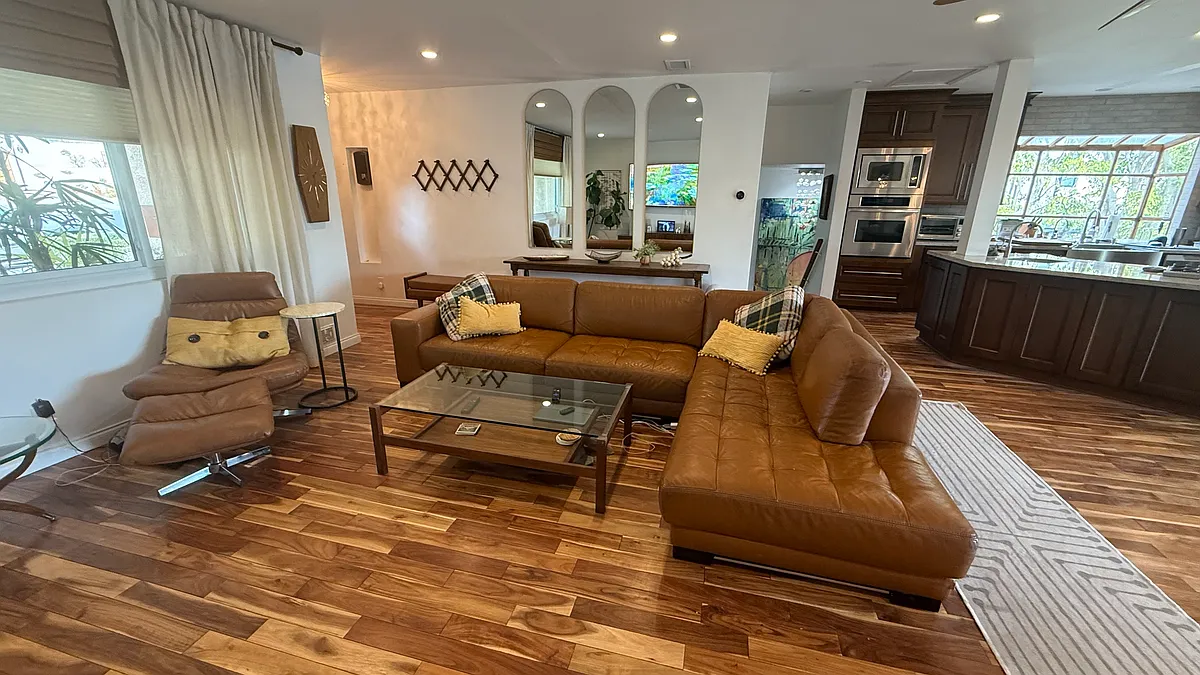Living room area looking toward stairs and primary bedroom - 1068 E San Jose Ave