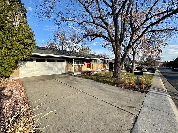 View of the front of the house, including 2 car garage and driveway