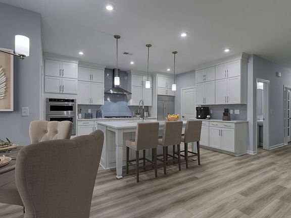 Kitchen connecting to dining area.