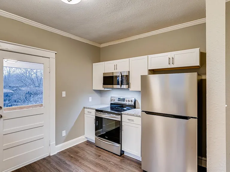 New stainless appliances in kitchen.