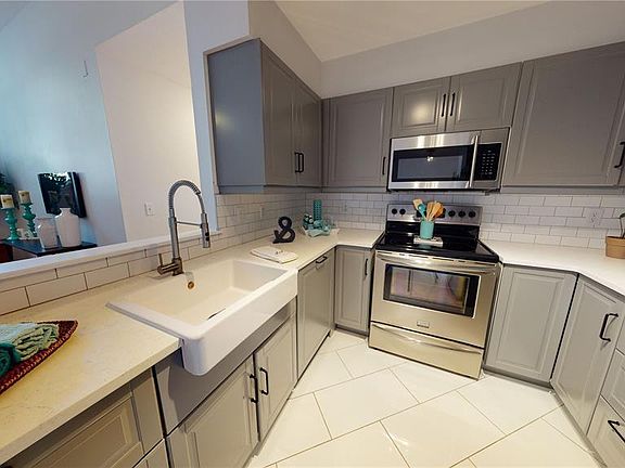 5th image of 701 Mirror Lake Dr N APT 113