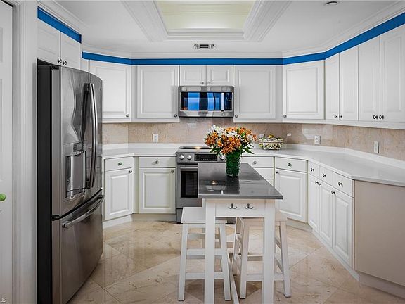 5th image of 7117 Pelican Bay Blvd APT 1008