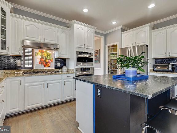 Open Kitchen with Pass Through to Dining Room