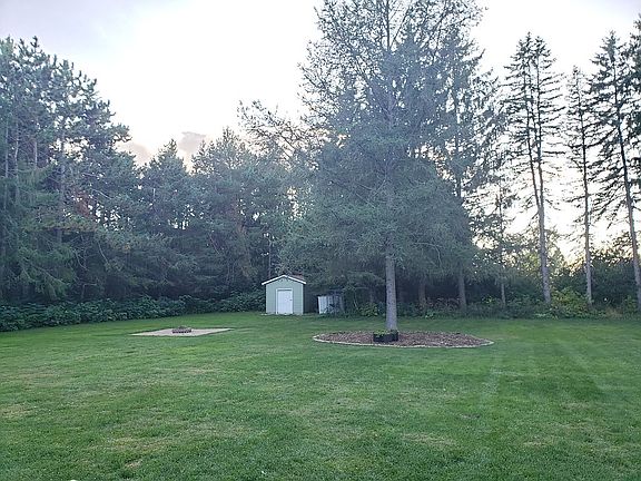 Backyard with utility garage