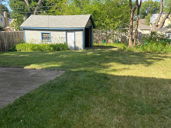 Private backyard with single stall garage