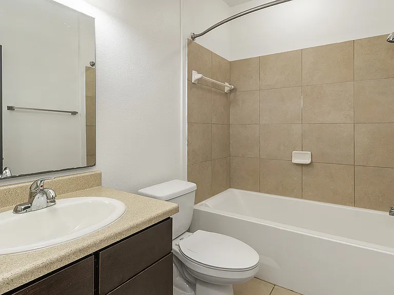 Bright and thoughtfully-designed bathrooms made for daily ease.
