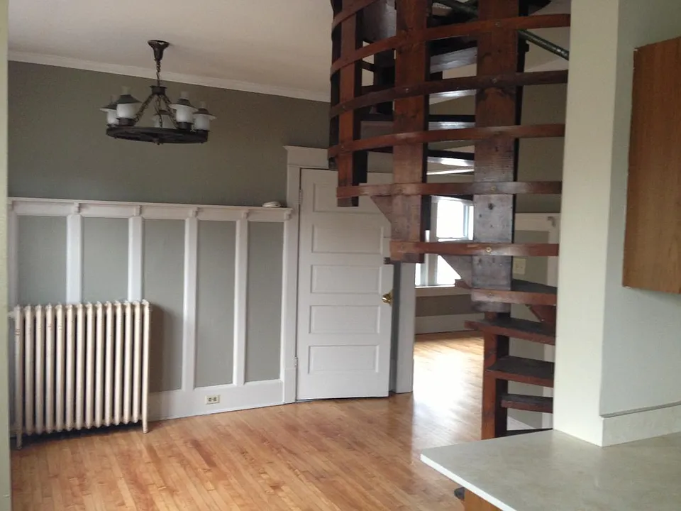 Living/Dining rooms with stairs to second floor