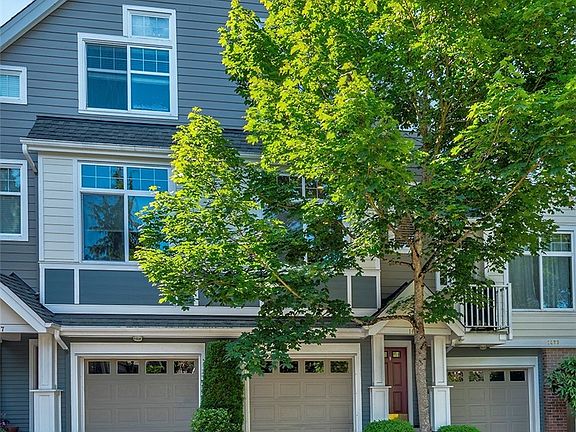 The marked garage is yours and the front door is to the right of it on Huckleberry Circle.
