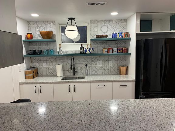 View from breakfast bar to kitchen
