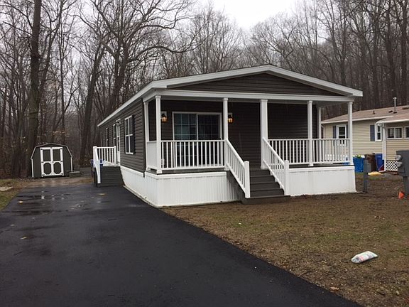 Full porch and storage shed