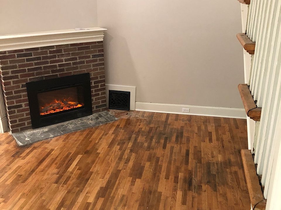 Electric fireplace in entryway