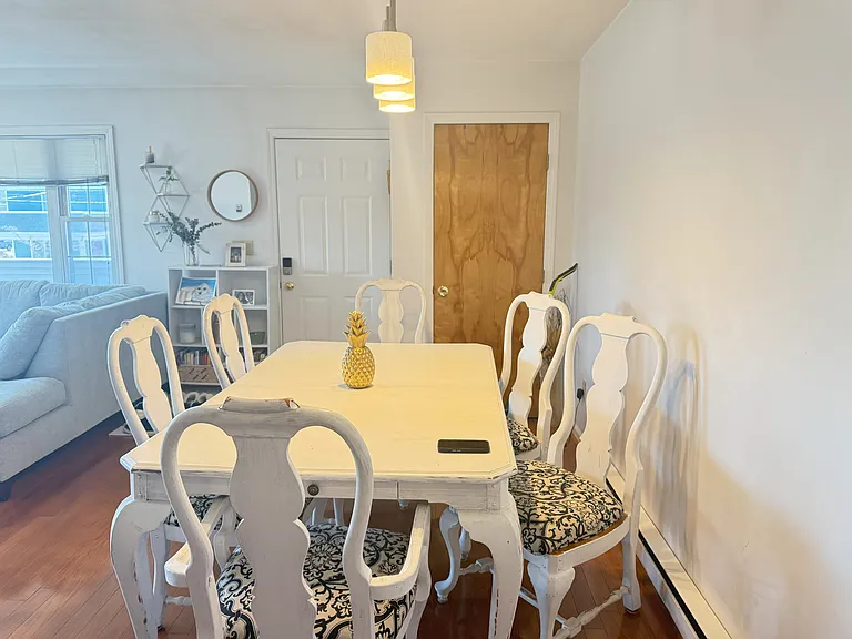 Dining area plus small breakfast bar.