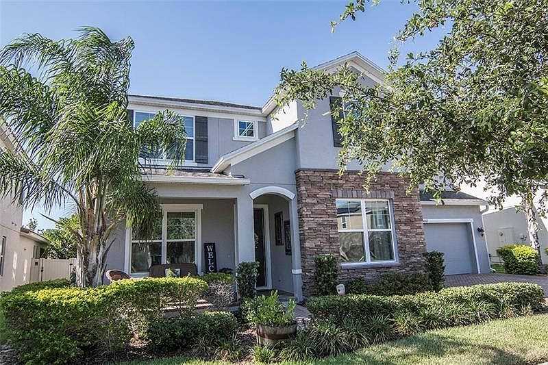 Upgraded Elevation with stacked stone and Cozy front porch!