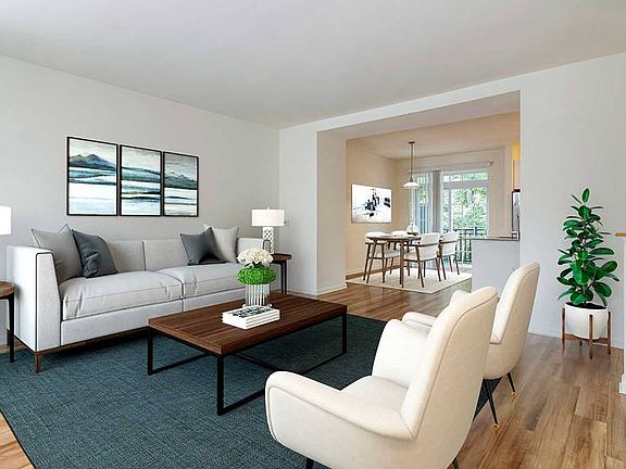 Newly renovated Finish Package III living and dining areas with hard surface flooring