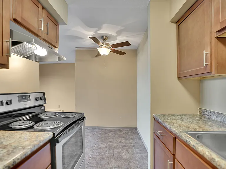 Updated kitchen and dining area with ceiling fan