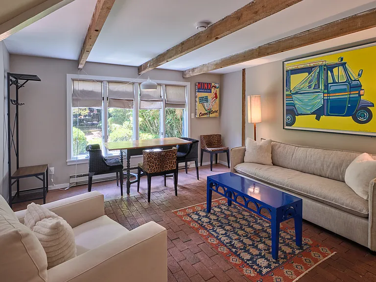 1st Floor - Cottage - Living Room and Table (WIFI Extender in this room)