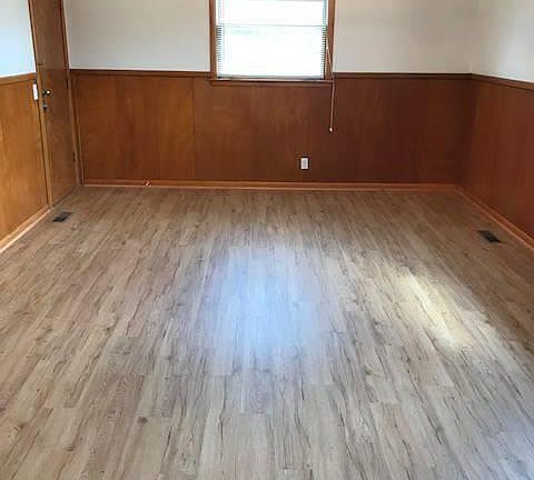 HUGE eat in kitchen with new flooring