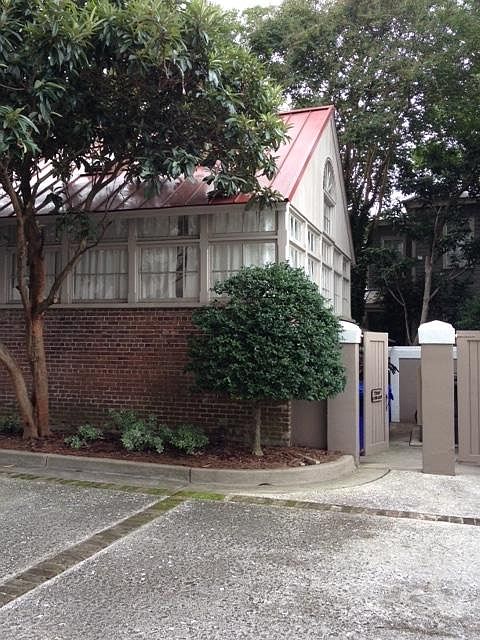 Outside view showing wall of windows which brighten the interior