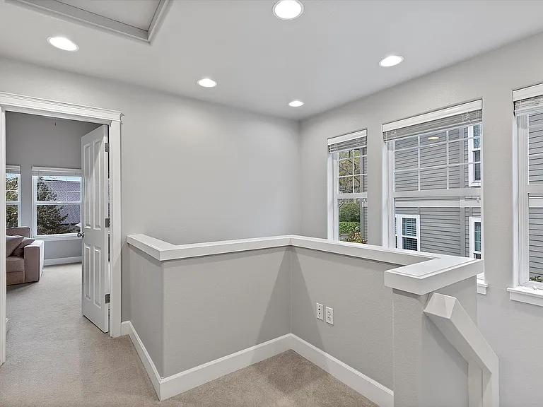 Upstairs hallway to all bedrooms and laundry