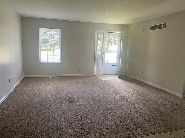 Upstairs Livingroom open to the kitchen