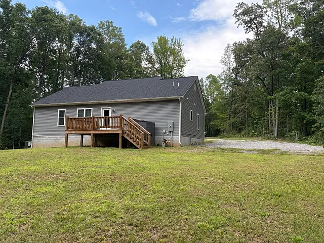 glimpse of storage shed right of stairs