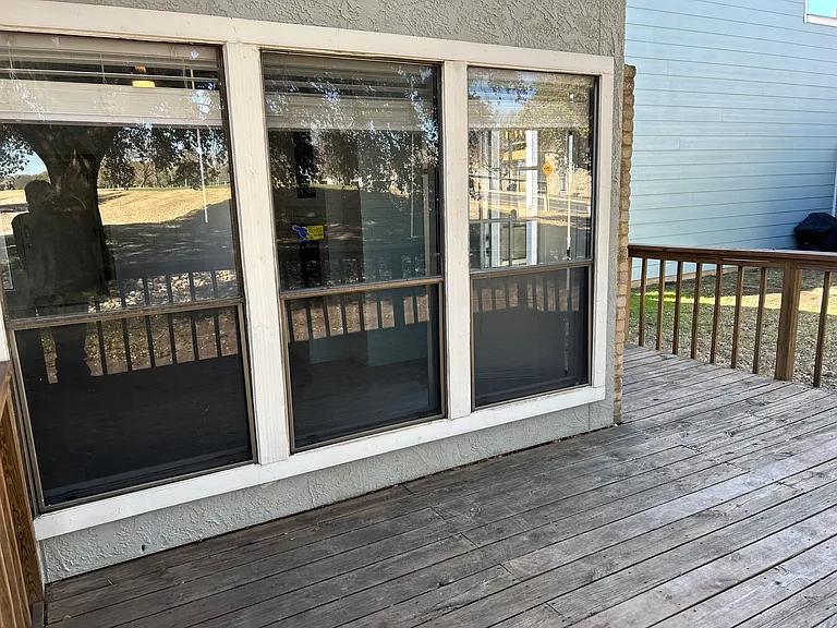 The patio wraps around the side and back of the home.