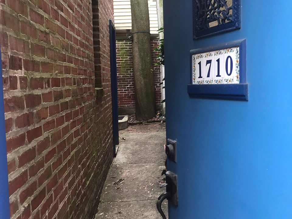 Private walkway next to garage.