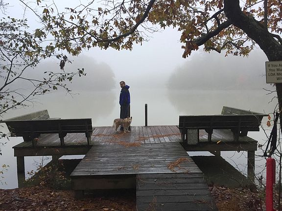 The swimming/fishing dock on a misty fall morning Tenants have the use of the lake and Lake Homeowners Association shared dock and picnic area, but they must adhere to the LOA rules and regulations. No gas powered boats are allowed.