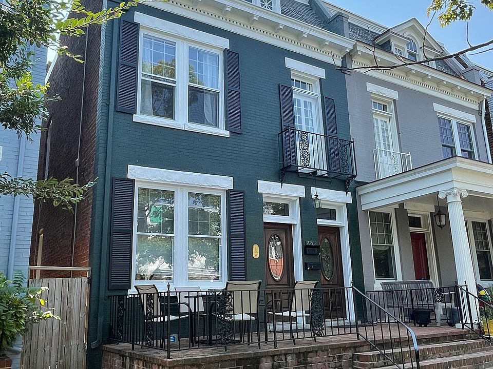 Front view of house with porch.